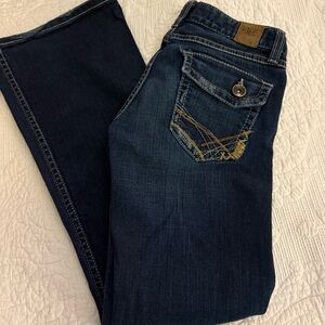 BKE Dark Indigo Boot Cut Stella Jeans in a size 27 Buckle